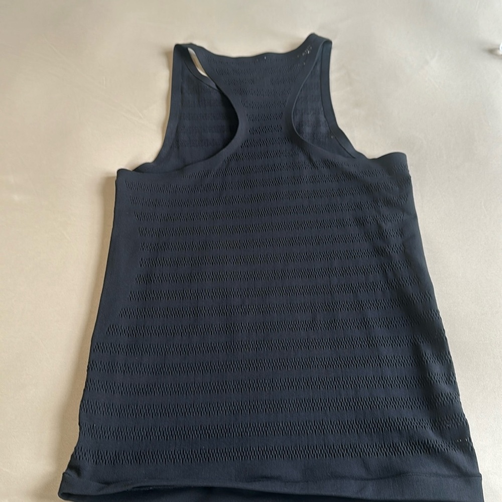 Lululemon Reveal Tank Top (striped hole patter on back)